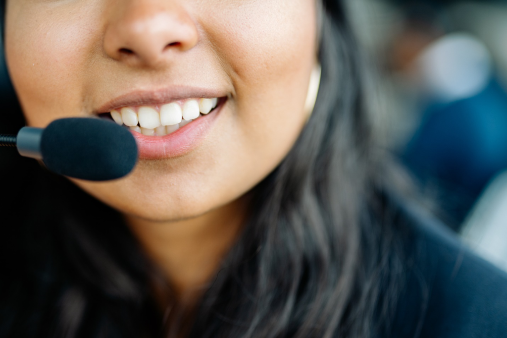 a woman wearing a headset mic